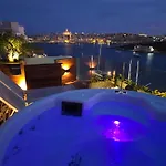 Unique Seafront Triplex Penthouse With Panoramic Bedroom & Rooftop Jacuzzi Overlooking Valletta