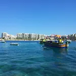 Unique Seafront Triplex Penthouse With Panoramic Bedroom & Rooftop Jacuzzi Overlooking Valletta