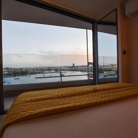Unique Seafront Triplex Penthouse With Panoramic Bedroom & Rooftop Jacuzzi Overlooking Valletta