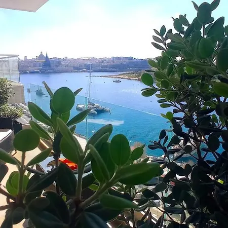 Unique Seafront Triplex Penthouse With Panoramic Bedroom & Rooftop Jacuzzi Overlooking Valletta *