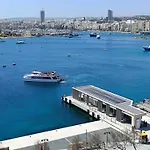 Unique Seafront Triplex Penthouse With Panoramic Bedroom & Rooftop Jacuzzi Overlooking Valletta *