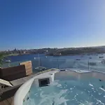 Apartment Unique Seafront Triplex Penthouse With Panoramic Bedroom & Rooftop Jacuzzi Overlooking Valletta *