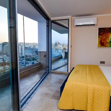 Apartment Unique Seafront Triplex Penthouse With Panoramic Bedroom & Rooftop Jacuzzi Overlooking Valletta