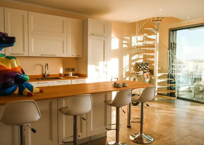 Unique Seafront Triplex Penthouse With Panoramic Bedroom & Rooftop Jacuzzi Overlooking Valletta *